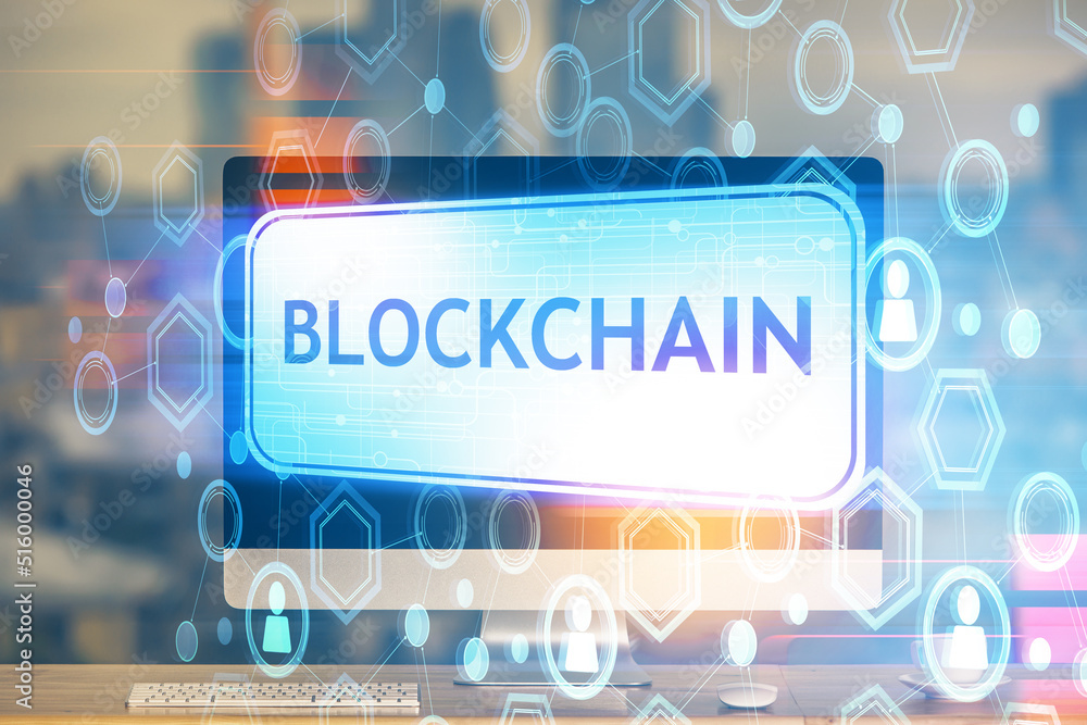 Multi exposure of blockchain theme hologram and table with computer background. Concept of bitcoin crypto currency. Multi exposure of blockchain theme hologram and table with computer background. Concept of bitcoin crypto currency.