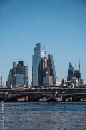 city skyline and river thames