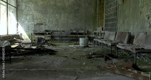 Abandoned ruined reception area in Pripyat hospital 