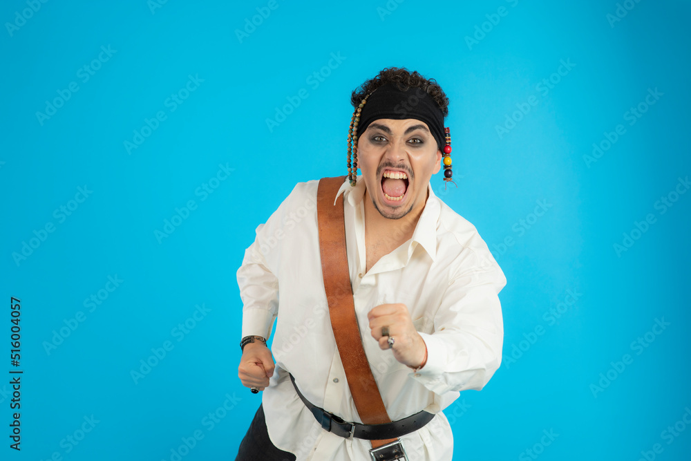 Angry Young pirate running straight to the camera Angry Young pirate running straight to the camera