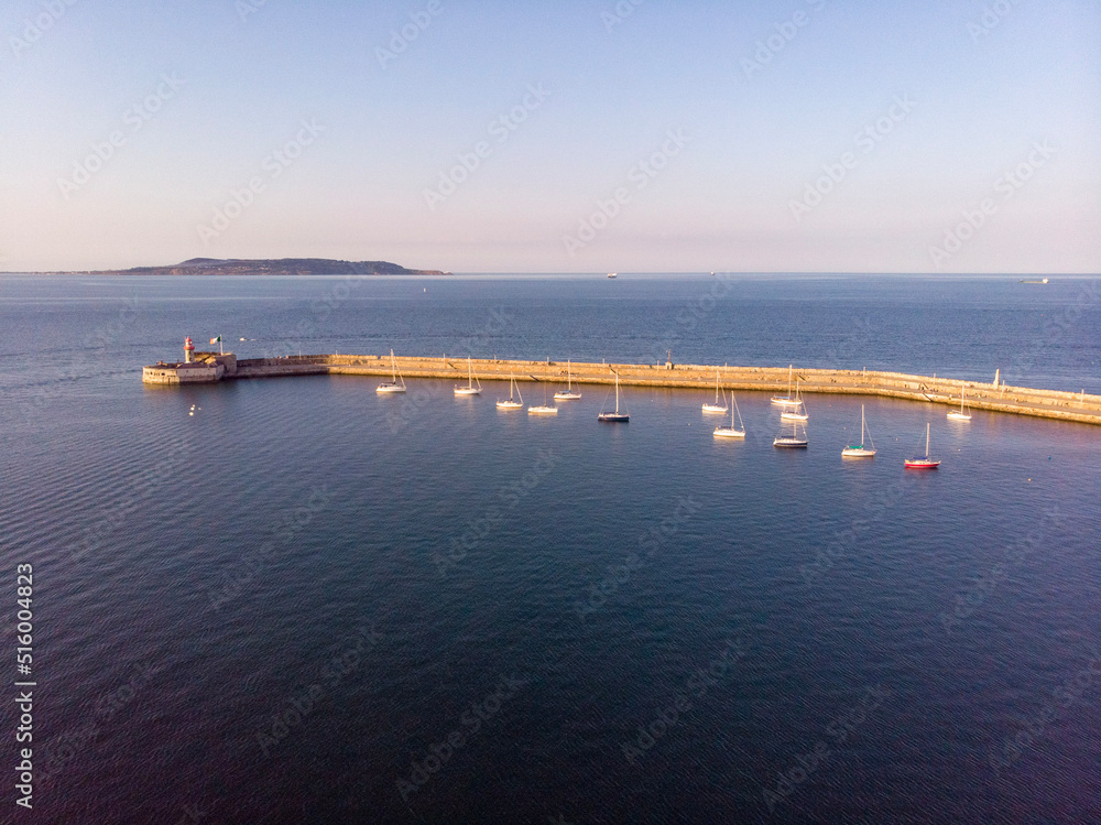 Aerial view of the sunset over the boat harbor in Dublin, South Dublin with Howth in the background Aerial view of the sunset over the boat harbor in Dublin, South Dublin with Howth in the background