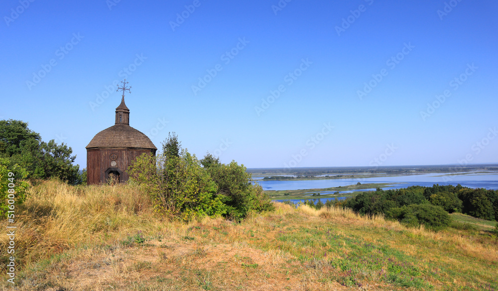 Wooden chruch on the banks of the Dnieper in Vytachiv, Ukraine	

