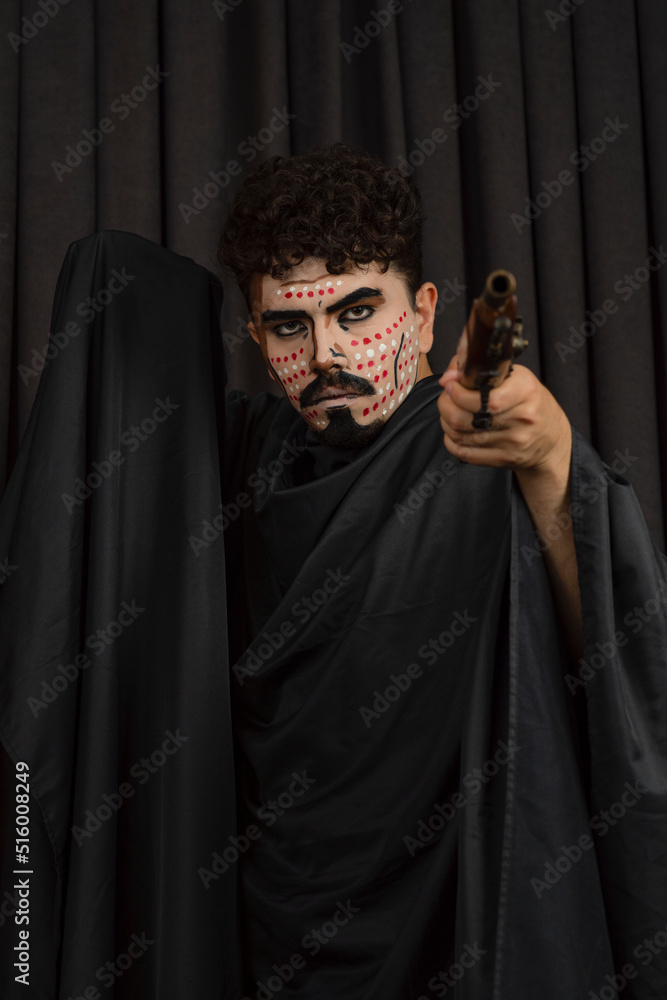 Young guy point gun to the camera Young guy point gun to the camera