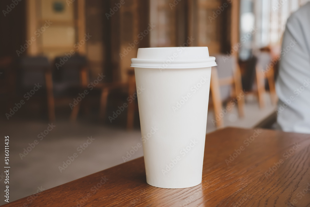 Paper coffee cup in coffee cafe. take away hot drink. Paper coffee cup in coffee cafe. take away hot drink.