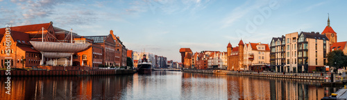 Gdansk, Poland. Panoramic view of Polish old town and Motlawa river during sunrise. Eastern Europe travel destination at Baltic sea
