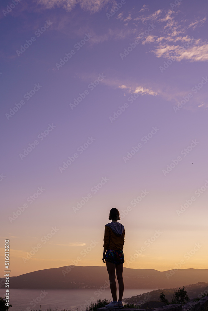 girl silhouette on beautiful landspace