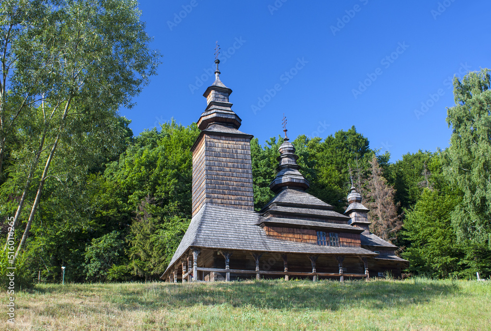 Old wooden church in in the museum of national architecture in Pirogovo, Ukraine	
