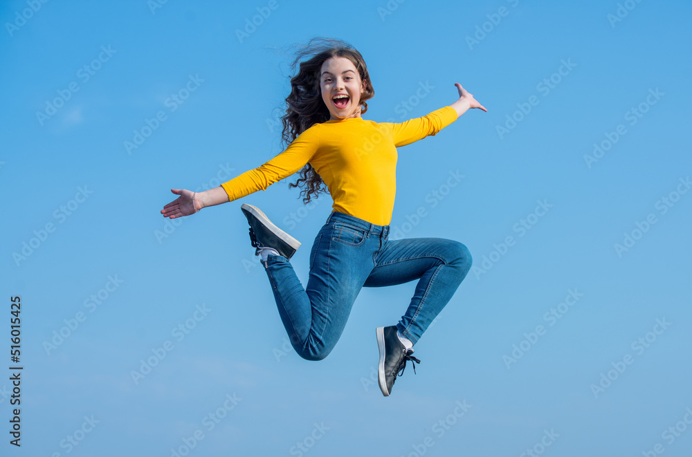 rejoicing teen girl jump high on sky background rejoicing teen girl jump high on sky background