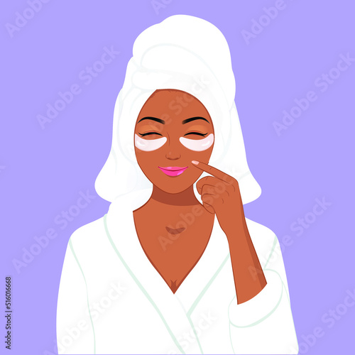Smiling african girl applying daily facial eye mask in bathrobe skincare nature beauty spa concept, Beauty model with perfect fresh skin cares about her skin at home