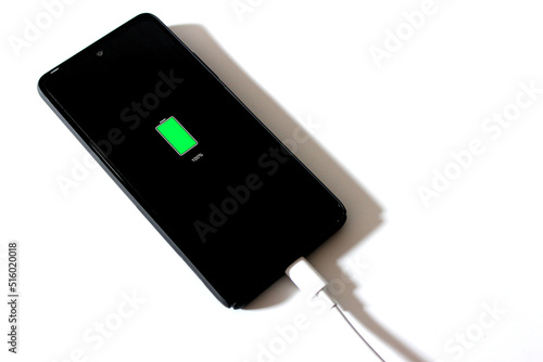 Fotografi 100% battery charged smartphone on the white background
