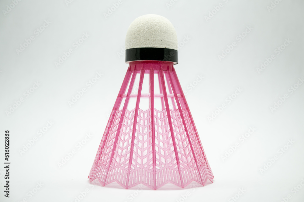 Badminton shuttlecock of purple color isolated on white background