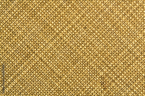 Abstract design background of lattice cell beige sand tan coarse-grained intersection texture of rough fabric with an interlacing. Linen sack textile canvas burlap cloth. Close-up  mock up  top view