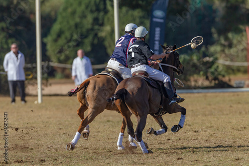 Polo Cross Players Horse Pony's Rider Fast Riding Game Action On Field © ChrisVanLennepPhoto