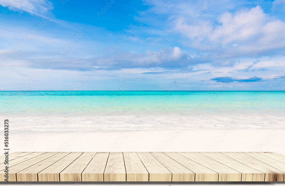Fototapeta premium Top of wood balcony table with seascape and palm leaves, sea and sky at beach