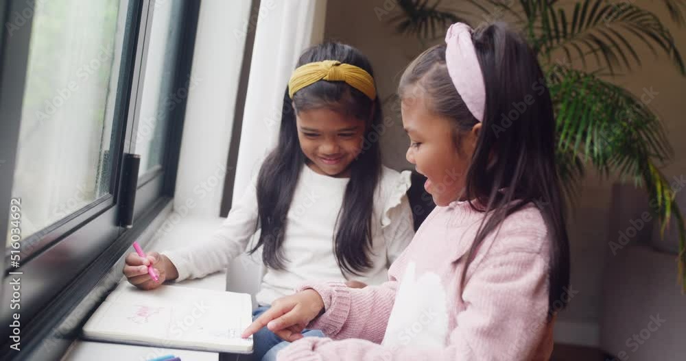 Two girls drawing and being creative at home. Sibling sisters learning ...