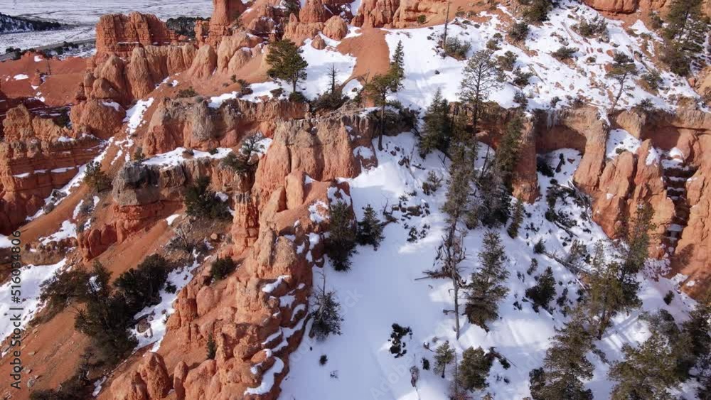 Aerial shot of the rugged and snow covered landscape of southern Utah in winter. Aerial shot of the rugged and snow covered landscape of southern Utah in winter.