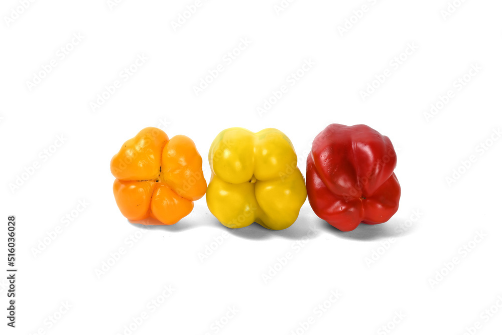 red and yellow peppers white background red and yellow peppers white background