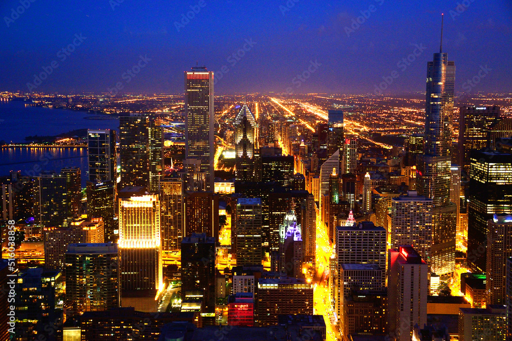 A twilight scene of Chicago, Illinois, shot from inside the Willis Tower