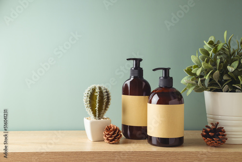 Photos Natural beauty SPA cosmetics bottles with labels for mock up packaging design on wooden table over green background
