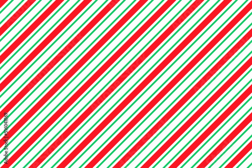 Candy cane striped pattern. Seamless Christmas print. Cute caramel red green package background. Xmas holiday texture with diagonal lines. Peppermint geometric wrapping paper. Vector illustration