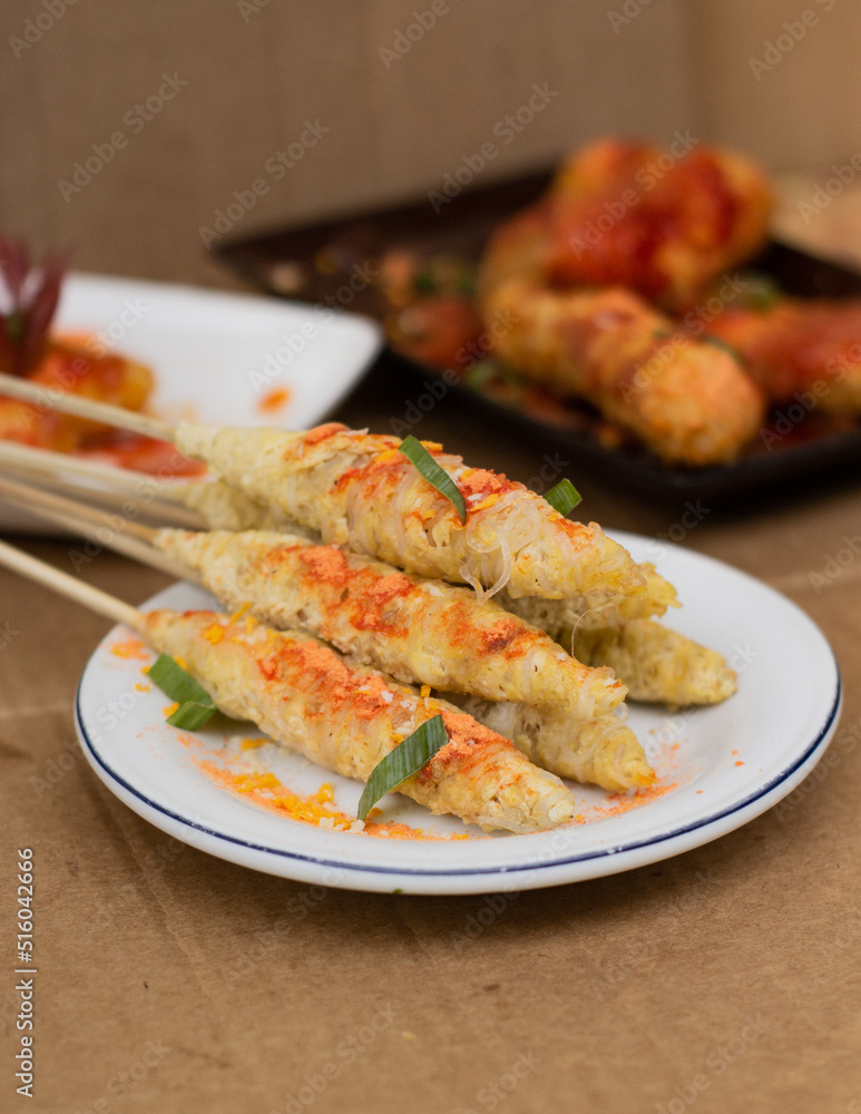 Egg Rolls, Indonesian street food, a combination of beaten egg and rolled noodles. selective focus concept