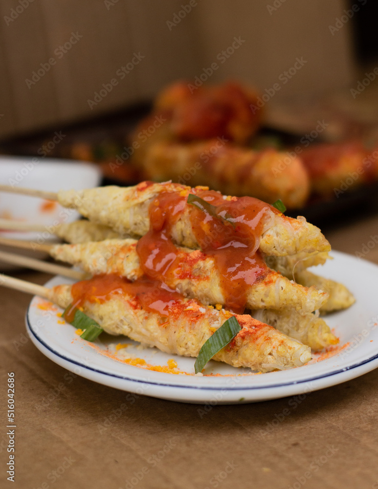 Egg Rolls, Indonesian street food, a combination of beaten egg and rolled noodles. selective focus concept