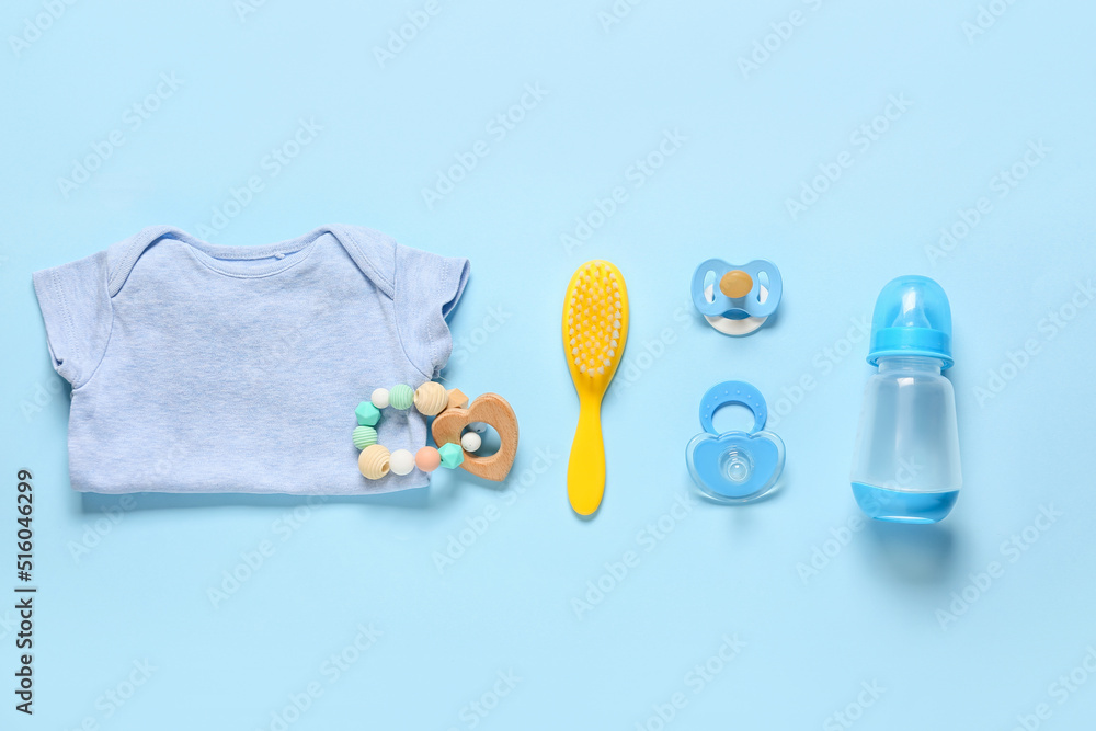Cute accessories for baby boy on blue background Cute accessories for baby boy on blue background