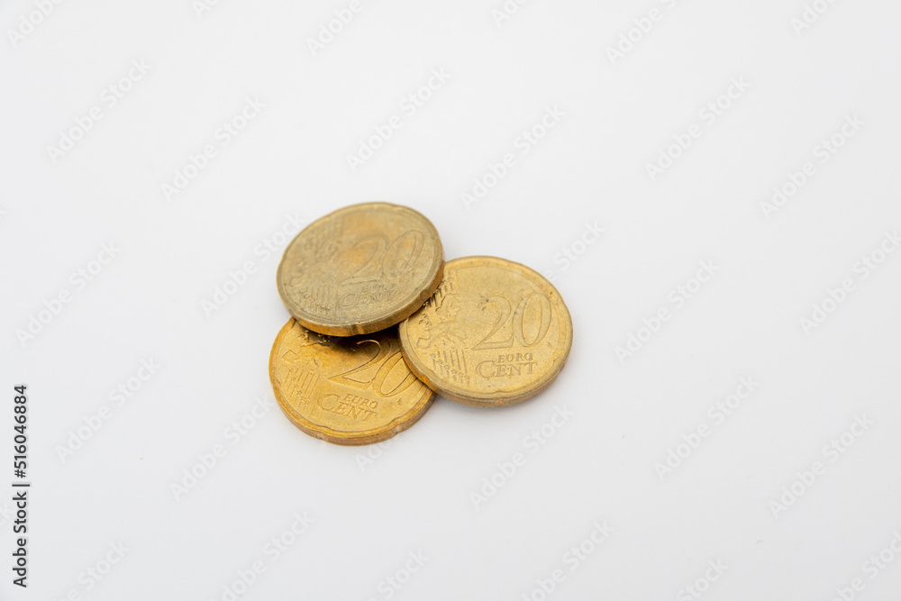Euro coins lying on a white background Euro coins lying on a white background