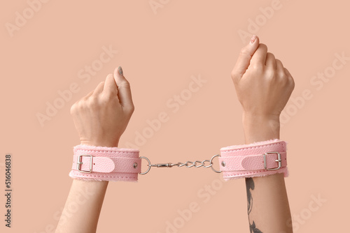 Female hands with handcuffs...
