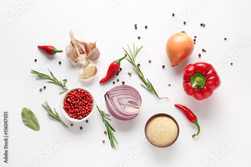 Fototapeta Naklejka Na Ścianę i Meble -  Composition with spices and vegetables isolated on white background