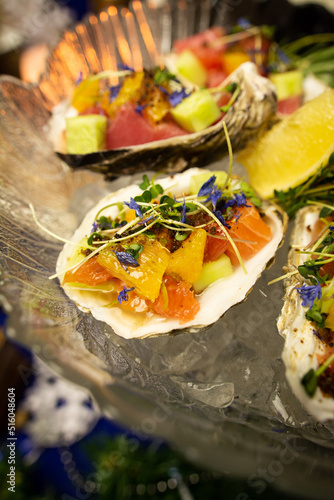 Tuna ceviche in a shell on the festive table