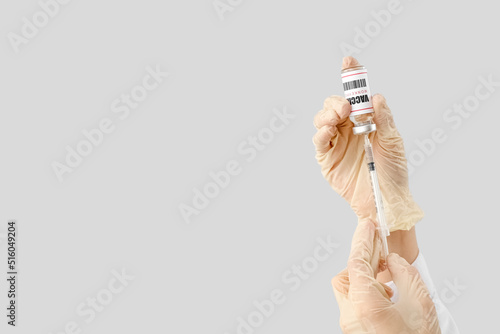 Hands of doctor with monkey...