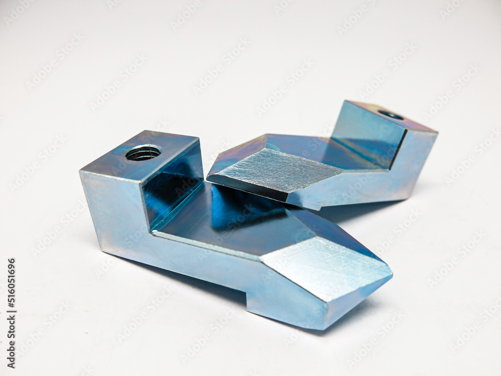 Metal, steel, stainless steel, aluminium, coated with chrome, silver bronze, blue and blue, 2 pieces, perforated and threaded, pointed, arranged over the center of the body on a white background. Metal, steel, stainless steel, aluminium, coated with chrome, silver bronze, blue and blue, 2 pieces, perforated and threaded, pointed, arranged over the center of the body on a white background.