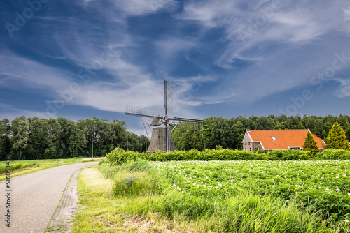 Groningen landscape with octagonal watermill de Fraeylemamolen on the Groenedijk in Slochteren, originally for drainage of the Grote Oosterpolder and now managed as Groningen heritage photo