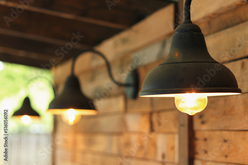 old lamp on the wall © Mason