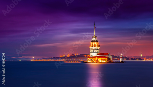 Istanbul, Turkey. Sunset over Bosphorus with famous Maiden's Tower (Kiz Kulesi) symbol of Istanbul, Turkey. Scenic travel background. photo