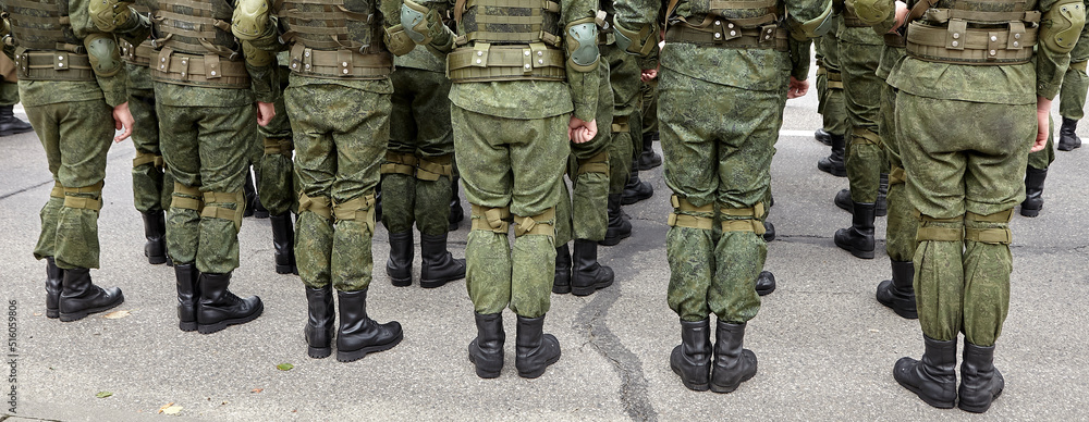 Soldiers in military camouflage uniforms in army formation. Soldiers in military camouflage uniforms in army formation.