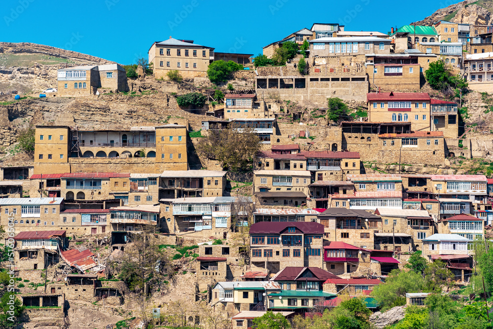 Obraz premium facades of houses located in tiers on a steep slope in the village of Chokh in Dagestan