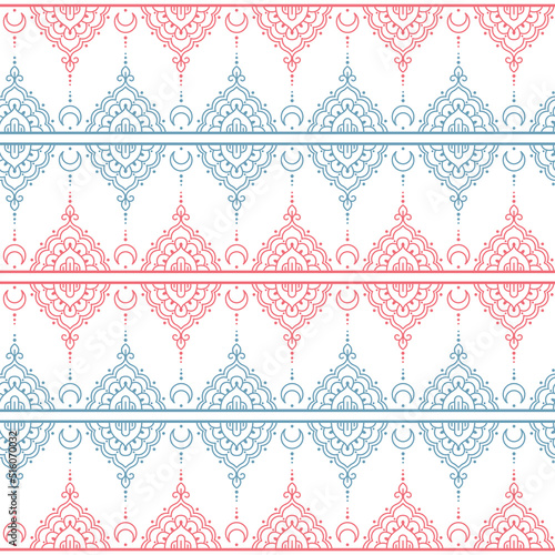 Seamless ethnic pattern with floral motives. Mandala stylized print template for fabric and paper. Boho chic design. Summer fashion. White, pink and blue.