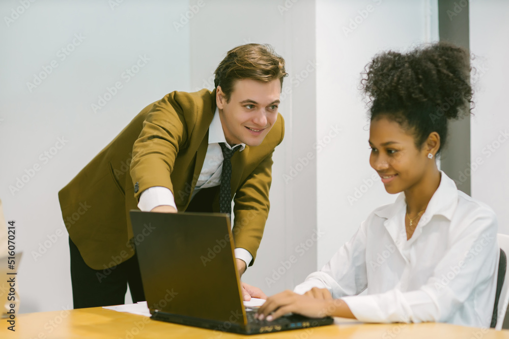 Diverse colleagues gather in brainstorm discuss statistics together. Group of people colleagues gather doing Brainstorming business plan together. Team Brainstorm Working Concept.