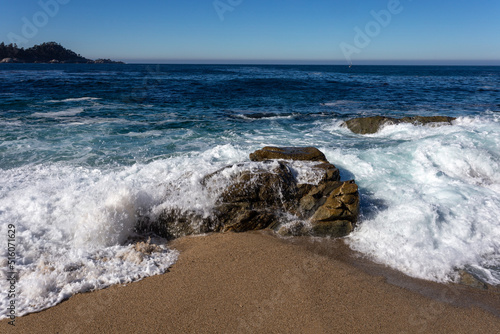 A view on the ocean with the rocks and waves