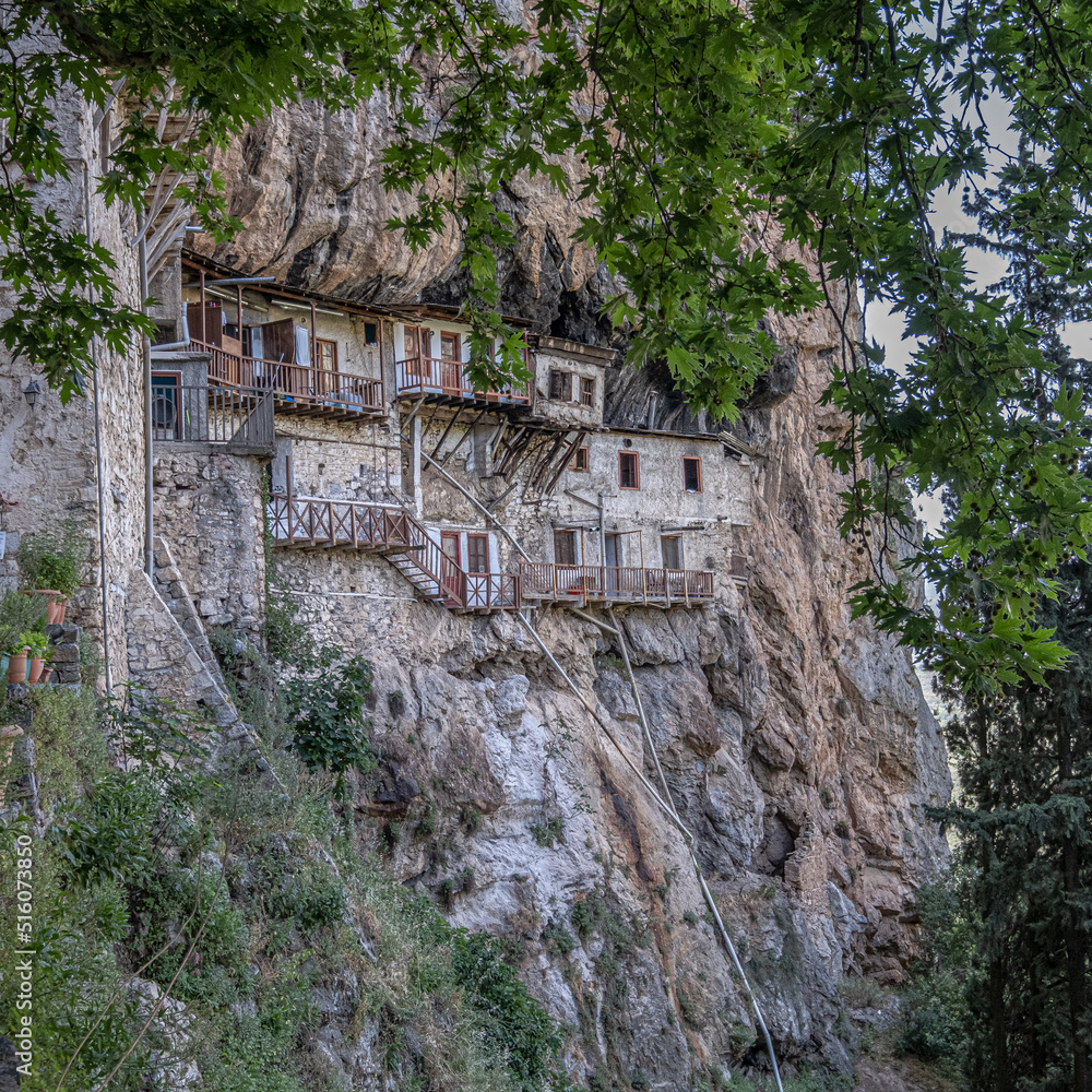 Prodromos Monastery, the largest and most historic in Peloponnese, hangs from the rocks above Lousios Gorge, located near Stemnitsa village, Arcadia, Greece.
