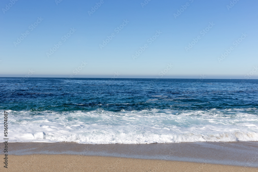 A view on the ocean with the rocks and waves