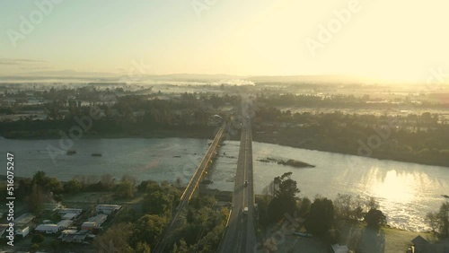 cruce aereo sobre puente en el amanecer photo