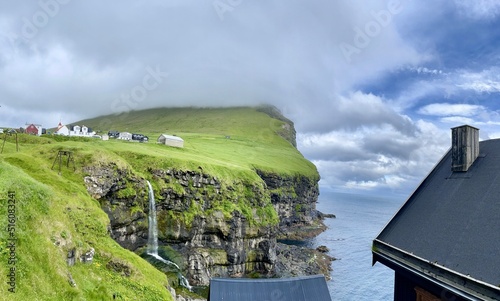 Amazing waterfall near Mikladalur village, Kalsoy, Faroe photo