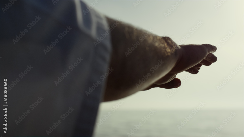 Fototapeta premium Sportsman hands waving training judo on seacoast close up. Athlete exercising.