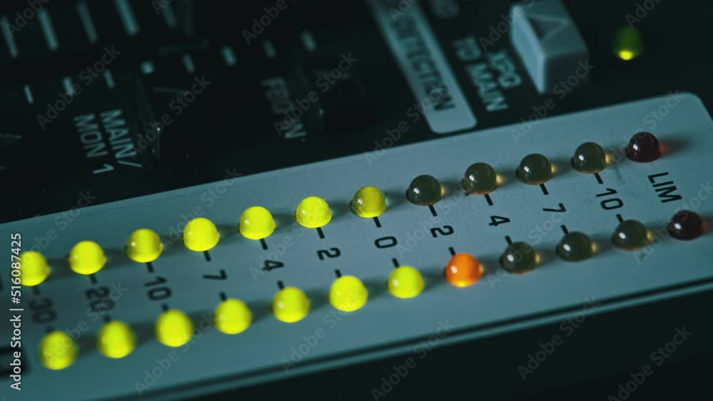 LED indicator of sound level signal on the mixing console. Closeup