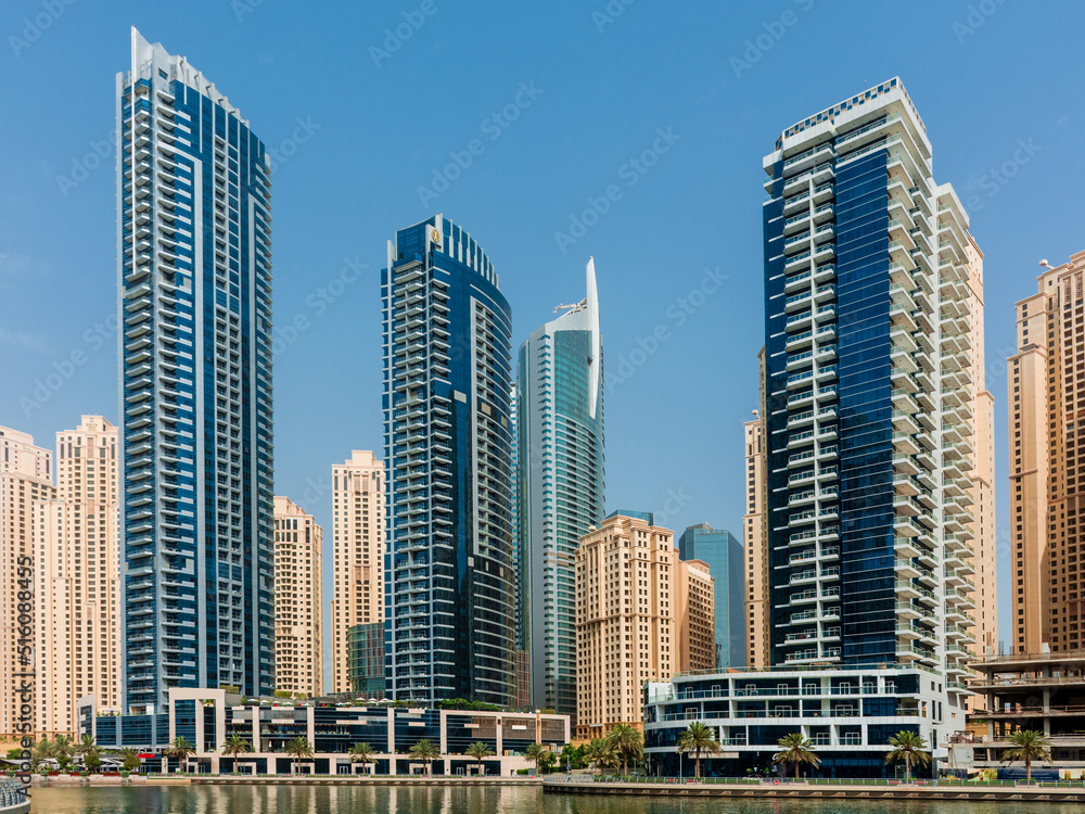 Daytime cityscape of Dubai, modern architecture of Dubai Marina area Daytime cityscape of Dubai, modern architecture of Dubai Marina area