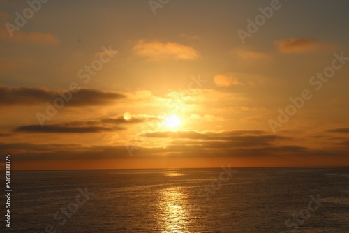 Orange sunset over the ocean © MINSOL