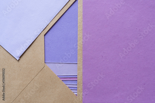 paper background with envelope and analogously colored paper